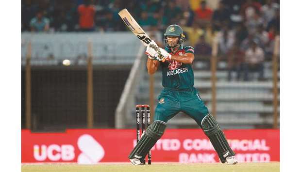 Bangladeshu2019s Mahmudullah plays a shot during the fourth Twenty20 international match of a tri-nation series against Zimbabwe at Zahur Ahmed Chowdhury Stadium in Chittagong, Bangaldesh, yesterday. (AFP)