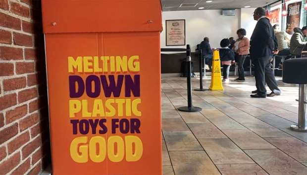 A plastic toy recycling box is seen inside a Burger King restaurant in Manchester
