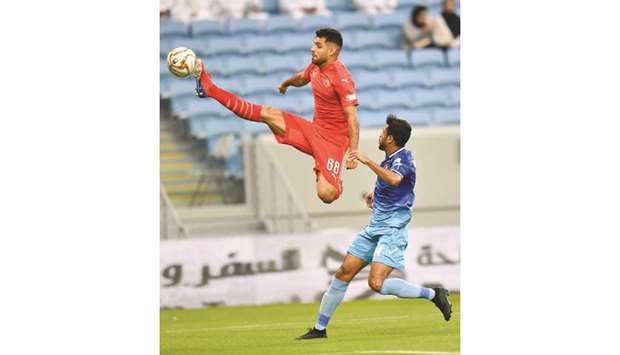 Al Arabiu2019s Morteza Janpour (left) in action during the QNB Stars League match against Al Shahania at the Al Janoub Stadium yesterday. PICTURE: Noushad Thekkayil