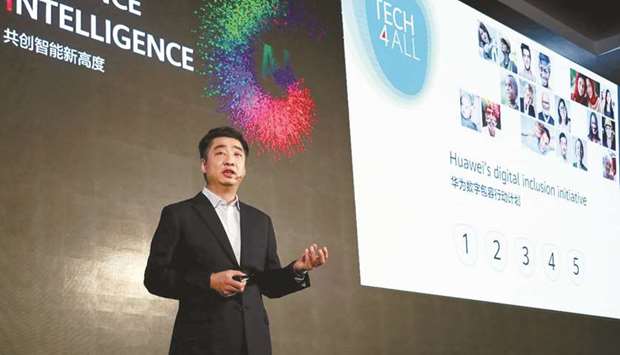 Ken Hu speaking at the TECH4ALL Summit.