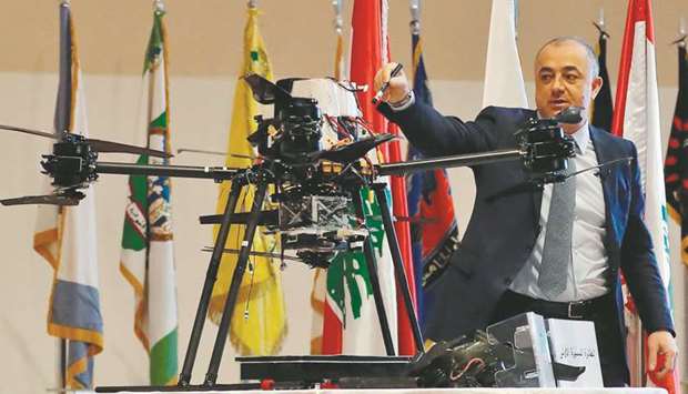Lebanese Minister of Defence Elias Bou Saab points at a part of an Israeli captured drone at a press conference in the Ministry of Defence in Yarze yesterday.
