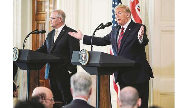 US President Donald Trump addresses a joint news conference with Australiau2019s Prime Minister Scott Morrison in the East Room of the White House in Washington. Trump said he doesnu2019t want to make a partial trade deal with China and that voters wonu2019t punish him for the ongoing trade war in his 2020 bid for re-election.