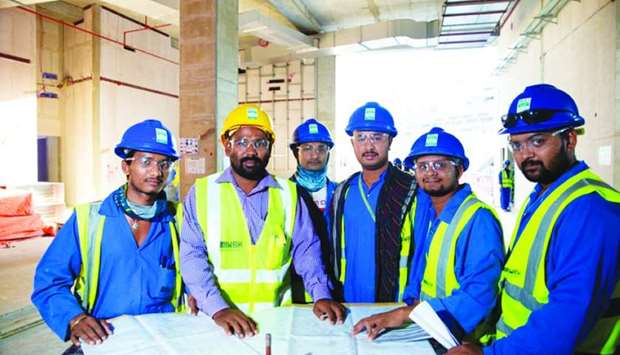 Onsite workers at Lusail Stadium. Images courtesy of SC website