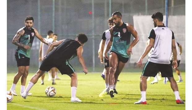 Al Duhail players train on the eve of their match against Al Wakrah.