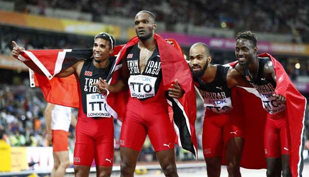 In this August 13, 2017, picture, members of the Trinidad and Tobago relay team celebrate after winning the gold medal in the menu2019s 4x400m relay final at the IAAF World Championships in London. (Reuters)