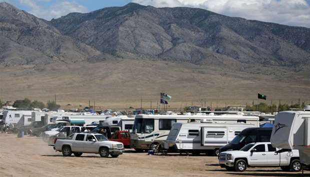 Participants arrive to an RV camp as an influx of tourists responding to a call to 'storm' Area 51, a secretive US military base believed by UFO enthusiasts to hold government secrets about extra-terrestrials, is expected in Rachel, Nevada