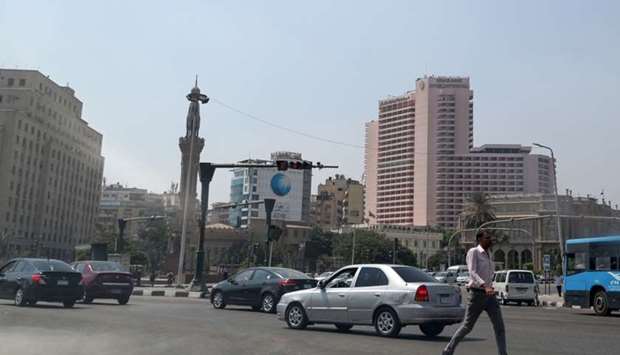 A man walks on a street in the Egyptian capital Cairo