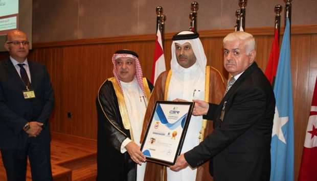 Qicca board member Dr Sheikh Thani bin Ali al-Thani receiving the title in Kuwait.