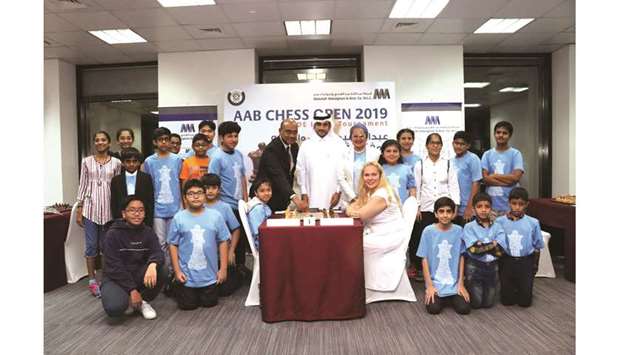 Abdullah Abdulghani & Brosu2019 acting CEO and COO of Automotive R K Murugan (centre) inaugurates the AAB Chess Open in the presence of QCA president Hamad al-Tamimi.