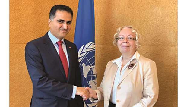 Ali Khalfan al-Mansouri shaking hands with Tatiana Valovaya.