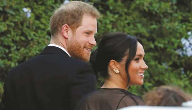 This picture taken on Friday shows the Duke and Duchess of Sussex, Prince Harry and his wife Meghan, arriving for the wedding of fashion designer Misha Nonoo at Villa Aurelia in Rome.
