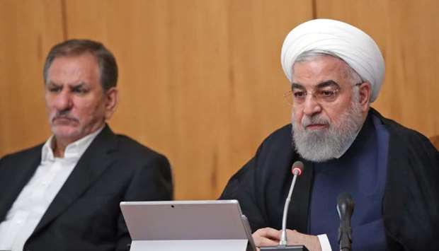 President Hassan Rouhani (R) chairing a cabinet meeting in the capital Tehran on September 18. AFP/Iranian Presidency/HO