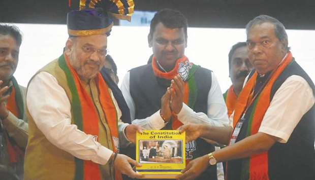 Home Minister Amit Shah attends a meeting of BJP workers in Mumbai yesterday.