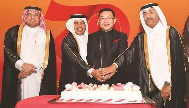 Dignitaries at the ceremonial cutting of the cake. PICTURES: Noushad Thekkayil