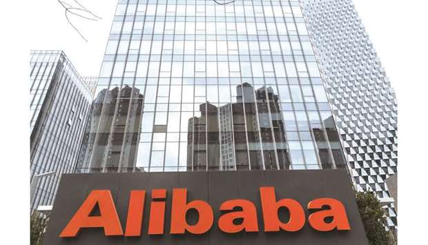Alibaba Group Holdings signage is displayed outside the companyu2019s offices in Beijing. Alibaba is hosting its annual investorsu2019 conference this week in Hangzhou against the backdrop of a worsening outlook for the country.