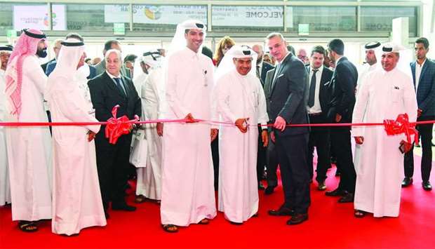 HE the Minister of Commerce and Industry Ali bin Ahmed al-Kuwari leading the ribbon-cutting ceremony of The Big 5 Construct Qatar in the presence of QNTC's Ahmed al-Obaidli, dmg events president Matt Denton and other dignitaries.
