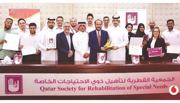 Vodafone staff receive their sign language certificates.