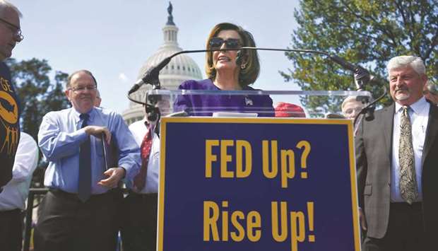 House Speaker Nancy Pelosi speaks at a Fed Up? Rise Up!u2019 rally outside the US Capitol in Washington yesterday.