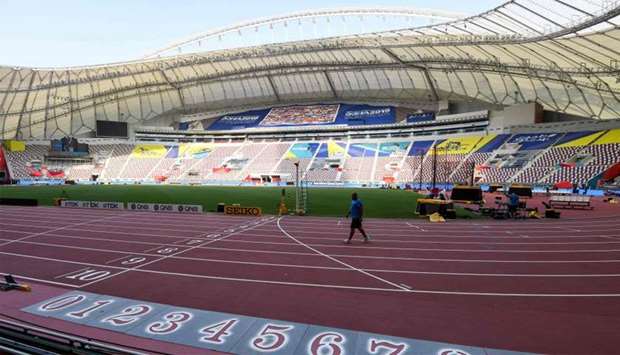A man walks inside the Khalifa International Stadium in Doha ahead of the IAAF World Athletics Championships