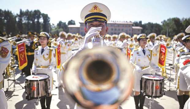 A member of Chinese military band in performance.