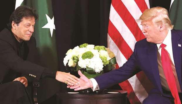 Re-engagement: Prime Minister Imran Khan shakes hands with President Donald Trump ahead of the annual UN General Assembly session in New York.