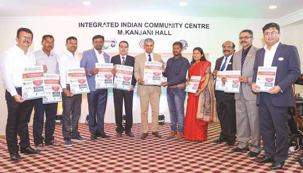 P Kumaran releasing the flyer.