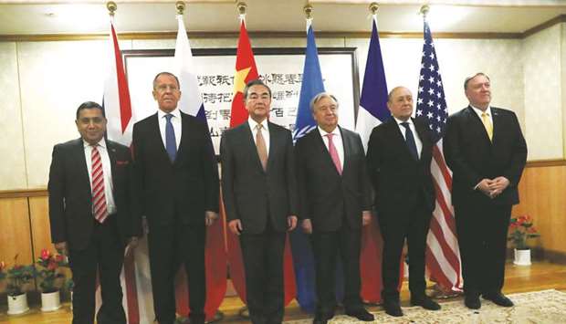 Chinese Foreign Minister Wang Yi poses with (from-right) US Secretary of State Mike Pompeo, French Foreign Minister Jean-Yves Le Drian, United Nations Secretary General Antonio Guterres, Russian Foreign Minister Sergey Lavrov and Britainu2019s Lord Tariq Ahmad during a lunch hosted by China of the permanent five veto-wielding members of the UN Security Council in New York on Thursday. Wang said China was willing to buy more US products, and said trade talks would yield results if both sides u201ctake more enthusiastic measuresu201d to show goodwill and reduce u201cpessimistic languageu201d in their trade dispute.