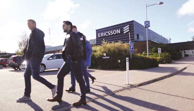 Workers walk outside the Ericsson factory in Boras, Sweden. Ericsson said it expects to pay $1bn to resolve investigations by US authorities into business ethics breaches in six countries, including China, in one of the costliest corruption cases on record.