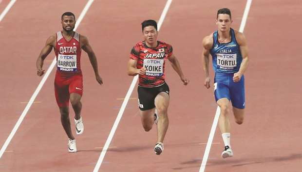 Qataru2019s Owaab Barrow (L), Japanu2019s Yuki Koike, and Italyu2019s Filippo Tortu in action in the 100m heats yesterday.
