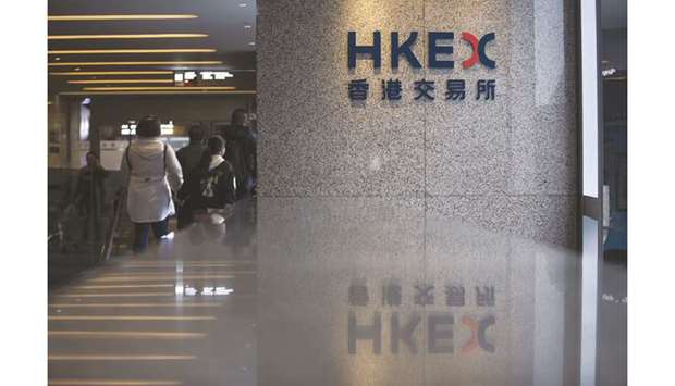 Signage for Hong Kong Exchanges & Clearing Ltd is displayed at the Exchange Square complex in Hong Kong. HKEX is in talks with banks for a loan between u00a37bn and u00a38bn ($9.8bn) to back its proposed takeover bid for London Stock Exchange Group, people familiar with the matter said.