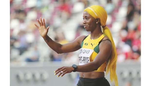 Jamaicau2019s Shelly-Ann Fraser-Pryce reacts after winning her 100 metres heat at the Khalifa International Stadium in Doha yesterday. (Reuters)