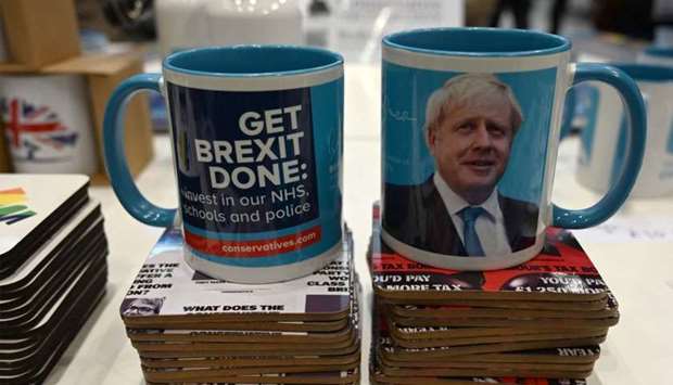 Mugs and coasters are seen for sale in support of Brexit and the Conservative leader