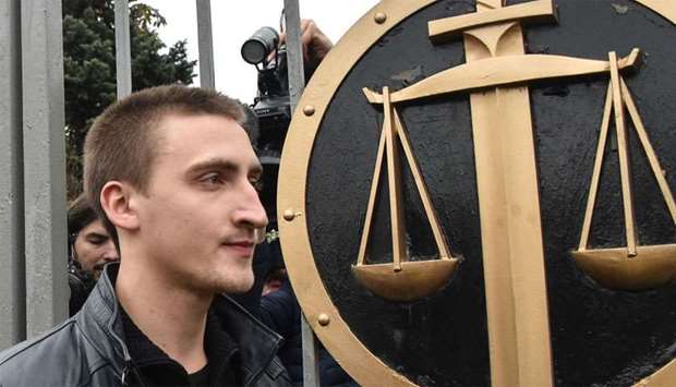 Pavel Ustinov, a young Russian actor aged 23, walks after a court hearing in a case that has sparked protests and a star-studded solidarity campaign in Moscow