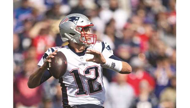New England Patriots quarterback Tom Brady (12) looks to pass the ball during the first quarter against the Buffalo Bills at New Era Field. PICTURE: USA TODAY Sports
