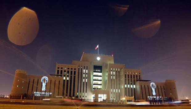 The tournament's official logo for the 2022 Qatar World Cup is seen on a building of Qatar's Ministr