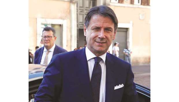 Italian Prime Minister Giuseppe Conte arrives at the Senate after meeting with Italian President Sergio Mattarella in Rome.