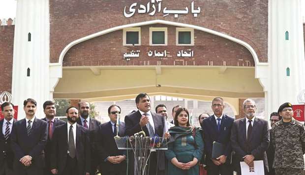 Foreign Ministry spokesman Mohamed Faisal, centre, briefs the media regarding a meeting with Indian officials on the third round of India-Pakistan talks of the Kartarpur Sahib Corridor at the Wagah border post yesterday.