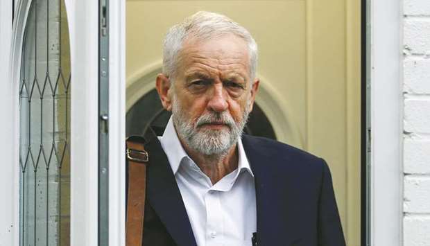 Britainu2019s opposition Labour Party leader Jeremy Corbyn leaves his home in London yesterday. The prospect of a victory by Corbynu2019s Labour Party is turning out to be the more worrisome development for Britainu2019s wealthiest people than a hard Brexit.
