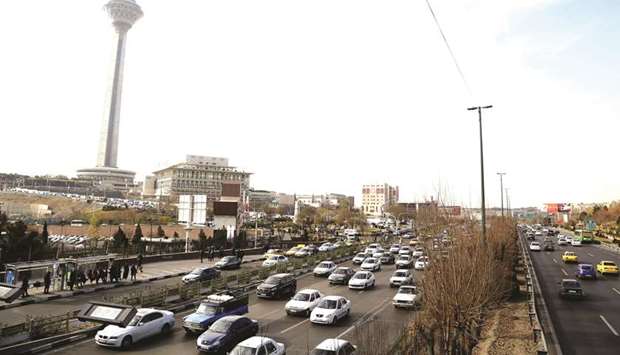 Traffic flows past Tehranu2019s landmark Milad Tower (file). European trade mechanism to barter humanitarian and food goods with Iran will not work until Tehran sets up a mirror company and meets global standards against money-laundering and terrorism financing, a French diplomatic source said.