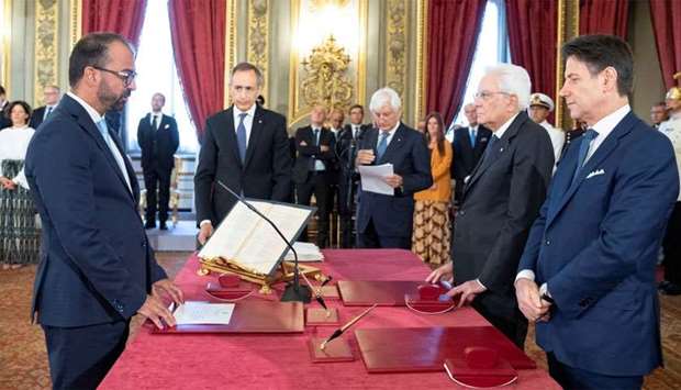 New Italian government is sworn in at the presidential palace in Rome