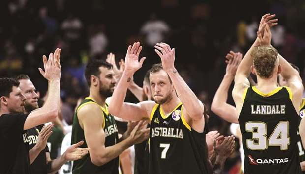 Australian players celebrates their win against Lithuania at the Basketball World Cup Group H game in Dongguan yesterday. (AFP)