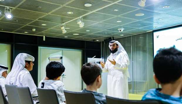 Mohamed al-Janahi delivering a lecture