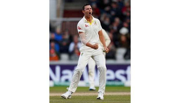 Australiau2019s Josh Hazlewood celebrates taking the wicket of Englandu2019s Jason Roy on the third day of the fourth Ashes Test at Old Trafford in Manchester, United Kingdom, yesterday. (Reuters)