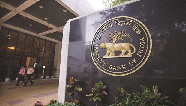 Reserve Bank of India signage is displayed at the entrance to the banku2019s headquarters in Mumbai. The Indian banking regulator is  currently looking at refurbishing some  regulations on treatment of cash margins as deposits, payment of interest on such margins, posting of collateral abroad to enable participants to move to global margining standards.