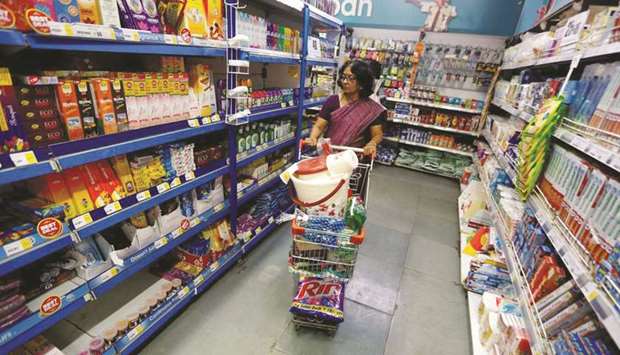 A woman shops at a supermarket in Mumbai. Indiau2019s annual retail inflation in July was 3.15%, down from an eight-month high of 3.18% in June.