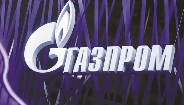 The logo of gas giant Gazprom is seen on a board at the St Petersburg International Economic Forum, Russia (file). Gazpromu2019s exports to the nine regional states fell 27% to 14.2 bcm from 19.5 bcm a year earlier, the figures published by the Russian energy giant showed.