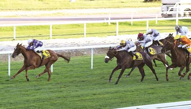 Francois-Xavier Bertras (left) rides Minu2019ha to victory in the French Arabian Breedersu2019 Cup Challenge u2013 Pouliches (Group 2 PA) in Toulouse, France, on Friday. (Robert Polin)