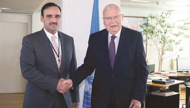 HE Hamad bin Nasser al-Missned shakes hands with Yury Fedotov, Executive Director of UNODC in Vienna.