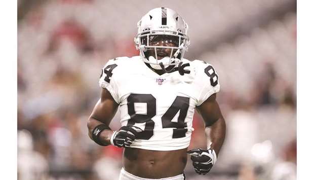 In this file photo taken on August 15, 2019 wide receiver Antonio Brown of the Oakland Raiders warms up before the NFL preseason game against the Arizona Cardinals at State Farm Stadium in Glendale, Arizona. (Getty Images/AFP)