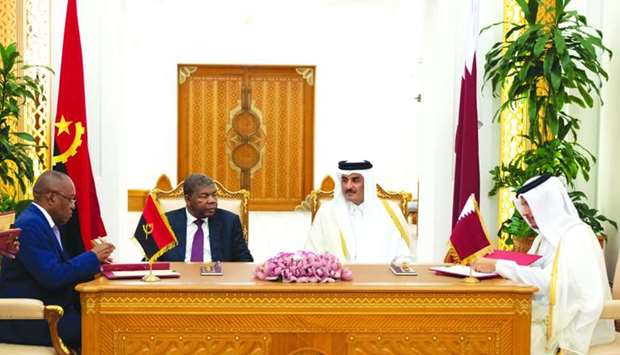 His Highness the Amir Sheikh Tamim bin Hamad al-Thani and Angolan President Joao Manuel Lourenco witness the signing of an agreement between Qatar and Angola at the Amiri Diwan